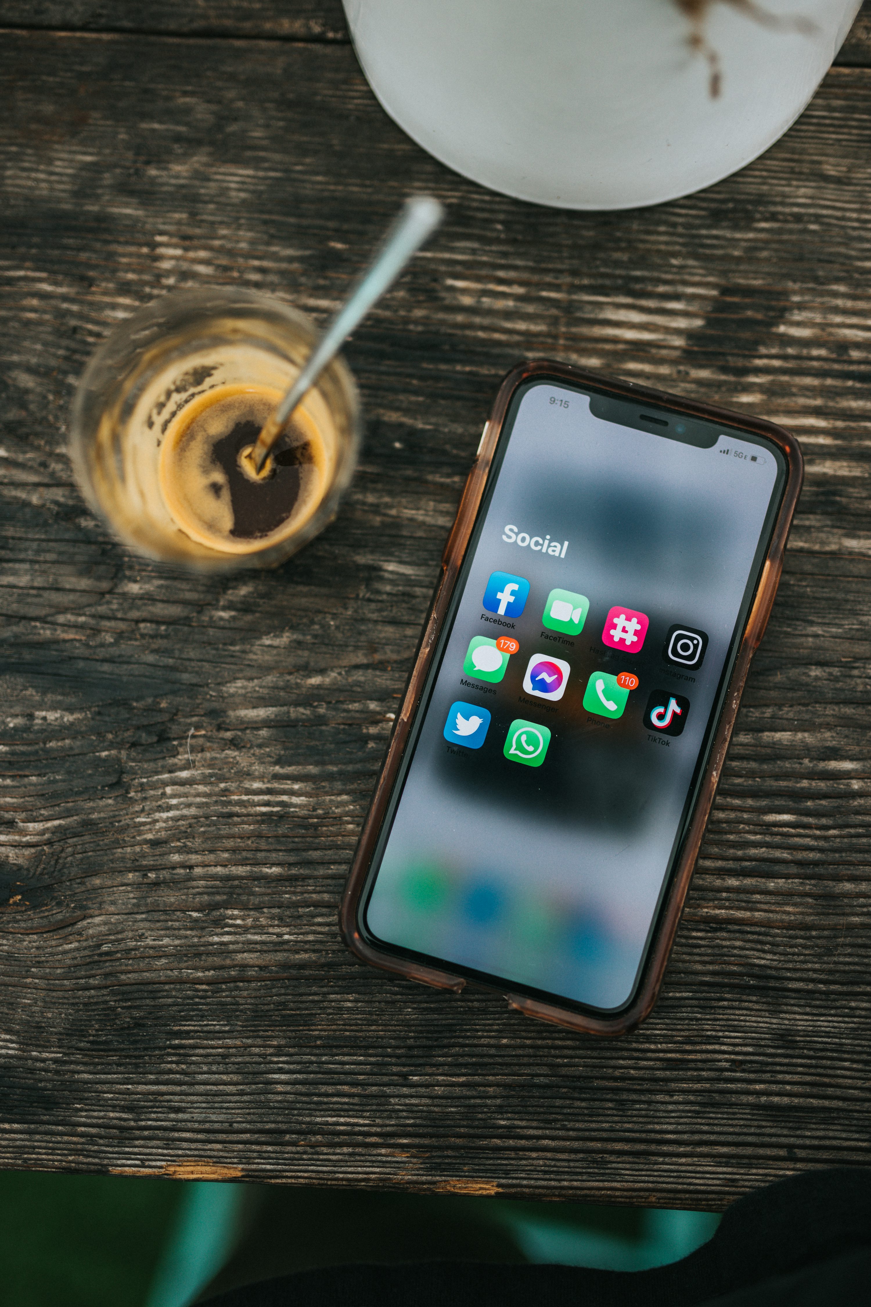 Content creator filming social media video on a smartphone
