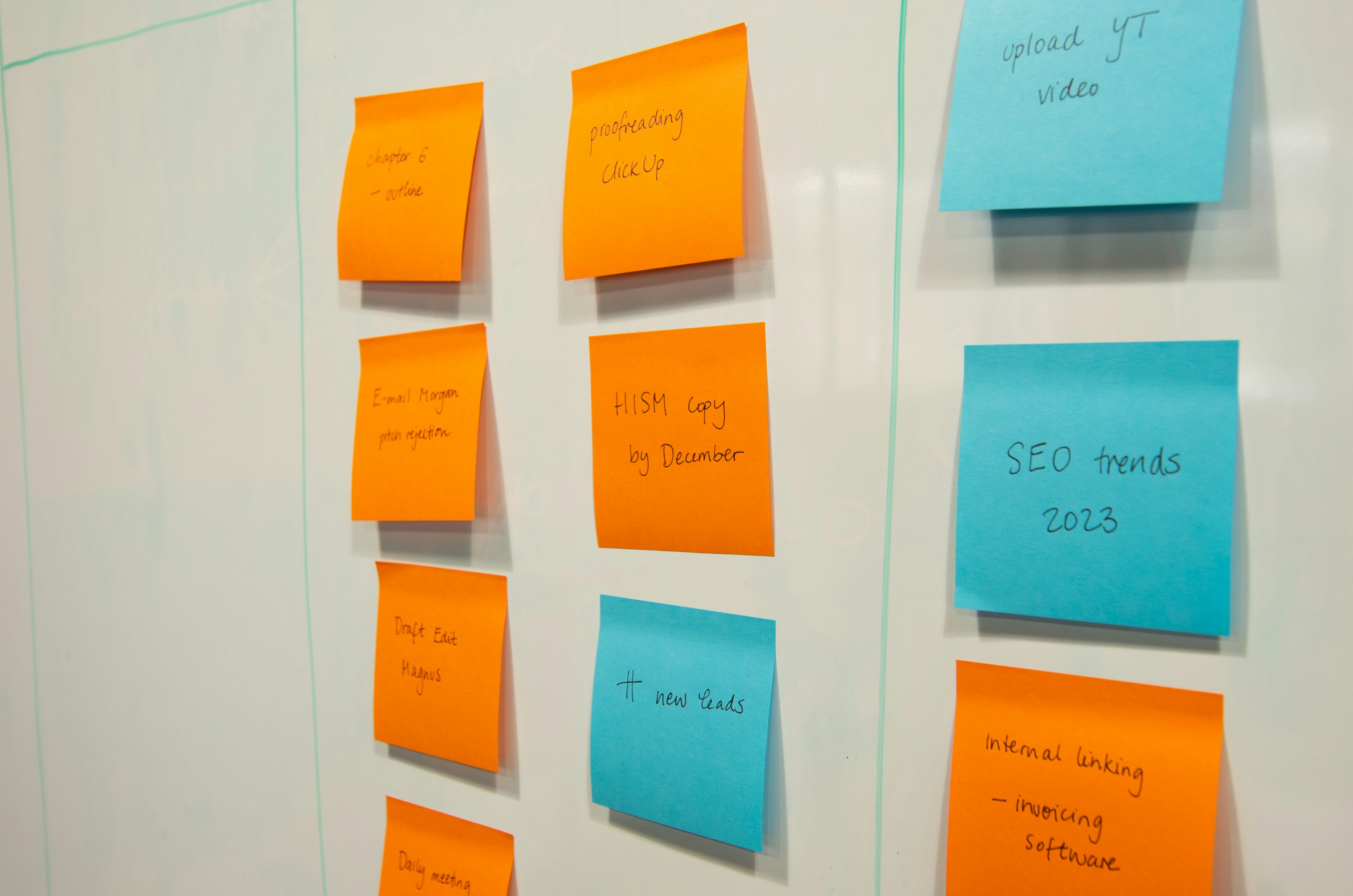 Team organizing content ideas with sticky notes